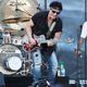 Front and center is Neal Schon, who's not riding the Trump train (Photo: Kevin Kane/Getty Images)
